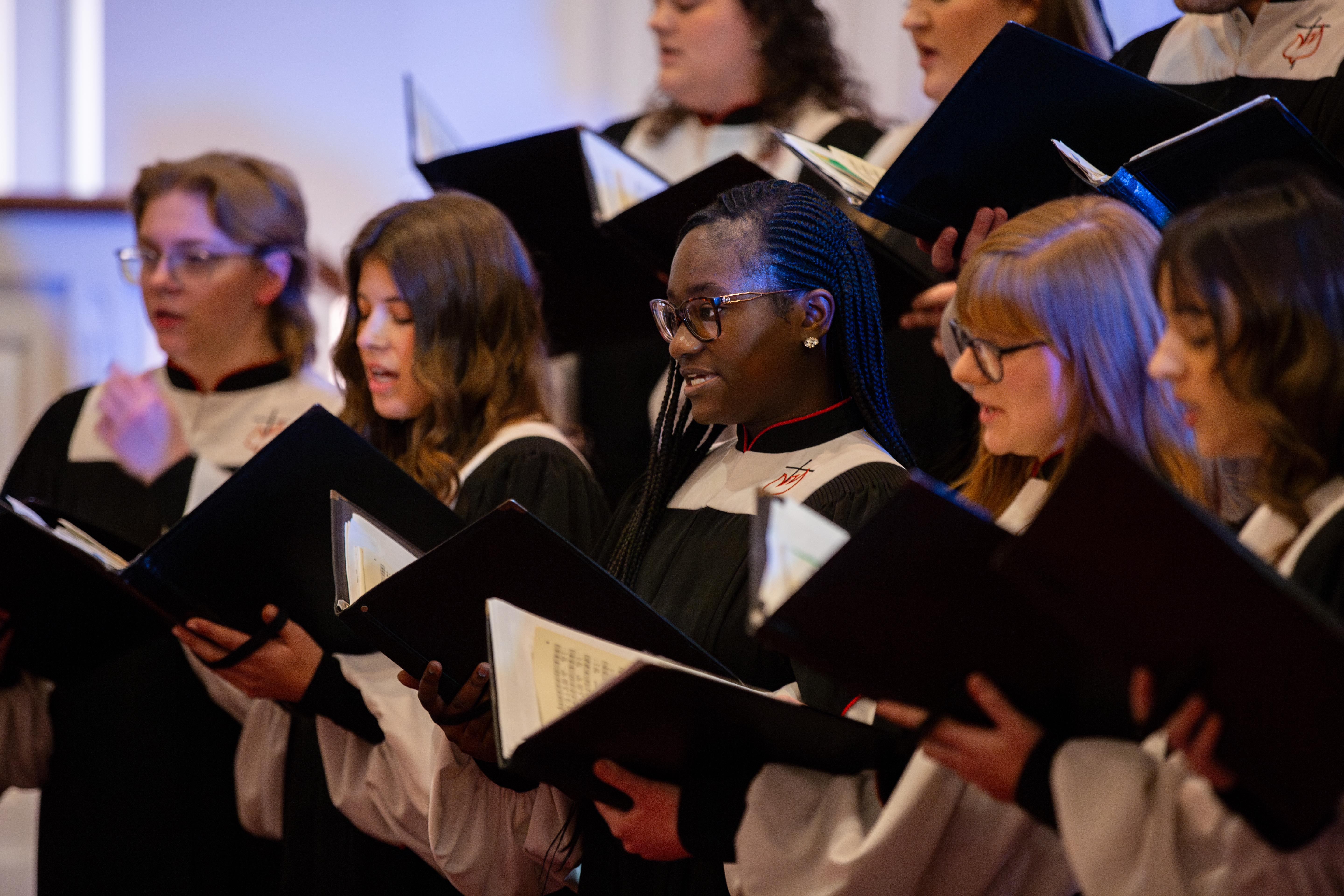 The Lamplighters touring choir during a 2024 concert