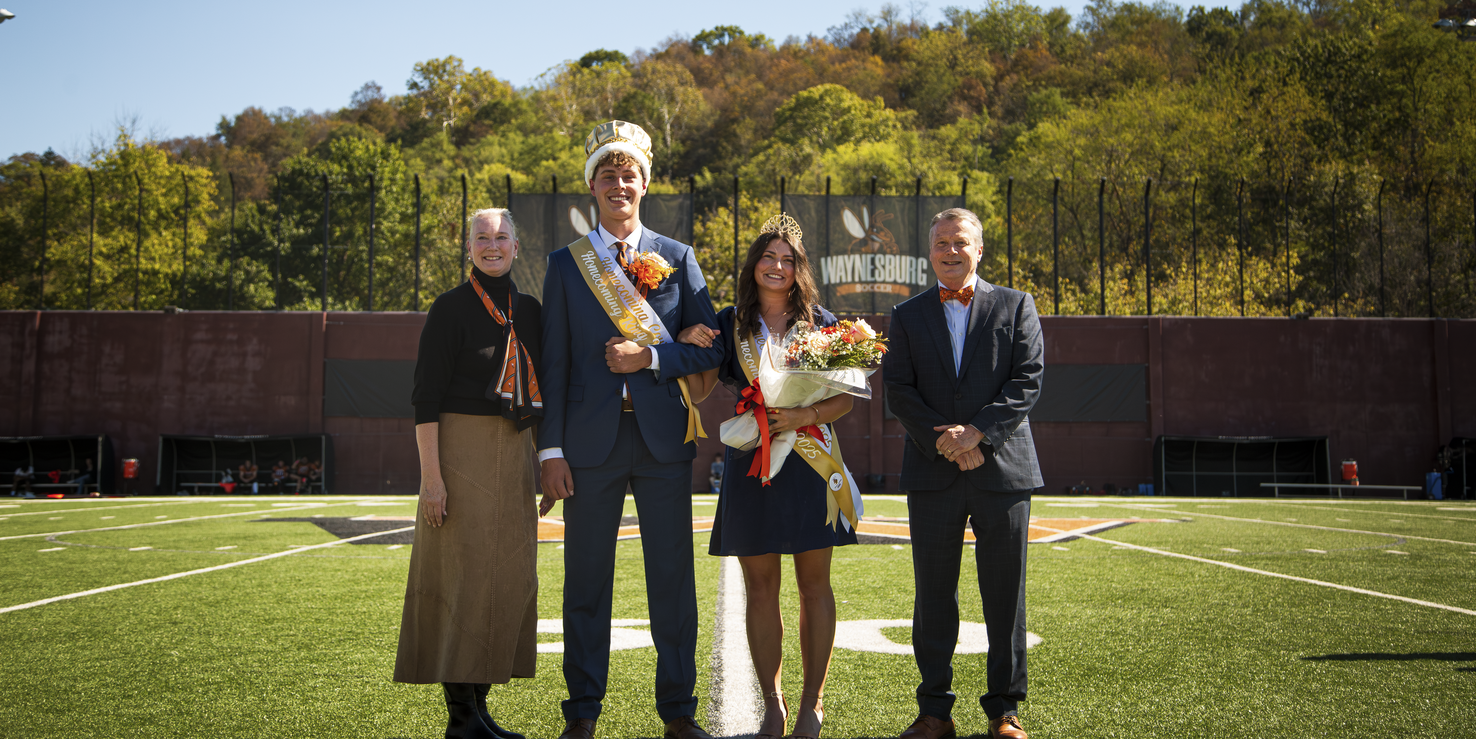 Homecoming King Hudson Pincavitch and Queen Aubrey Burns pictured with Dr. Mindy Walls, Provost, and President Doug Lee