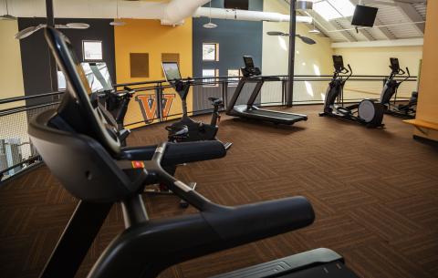 The 3rd floor of the Fitness Center on campus featuring cardio equipment