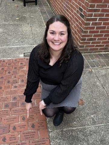 Katie with her personalized brick in Cusick Court