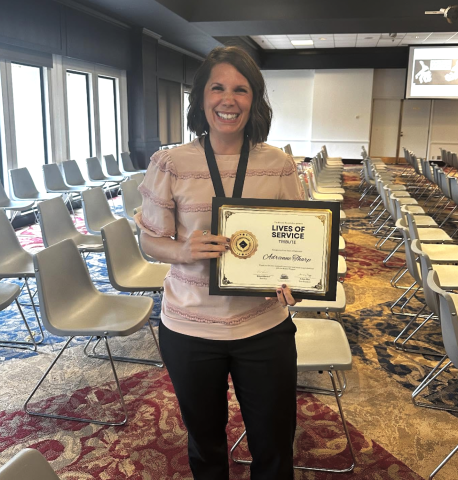 Adrienne Tharp receiving the Bonner Foundation "Lives of Service" award