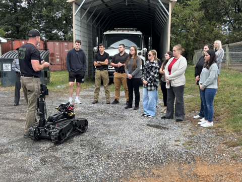 Students learning from Pennsylvania State Troopers