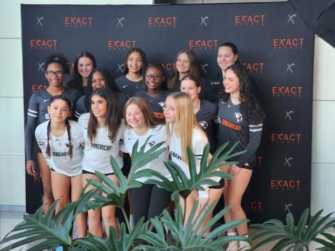 Johnston with her EXACT Sports volleyball team