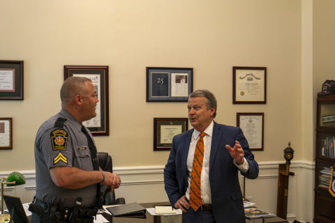 CPL. Marc Ziegler, Western Unit Recruitment Supervisor, and President Lee talk candidly in the President's Office.