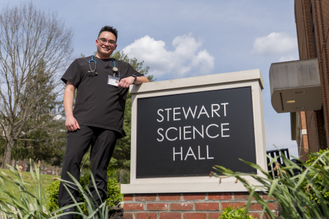 Ethan standing outside Stewart Science Hall