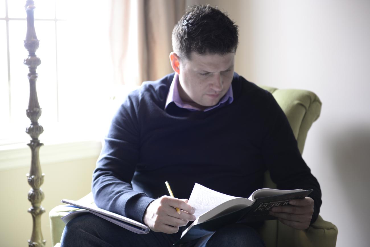 student reading a book