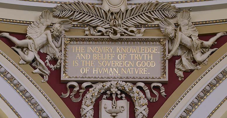 View of statue of Philosophy by Bela Pratt on the column entablature between two alcoves. Library of Congress Thomas Jefferson Building, Washington, D.C.