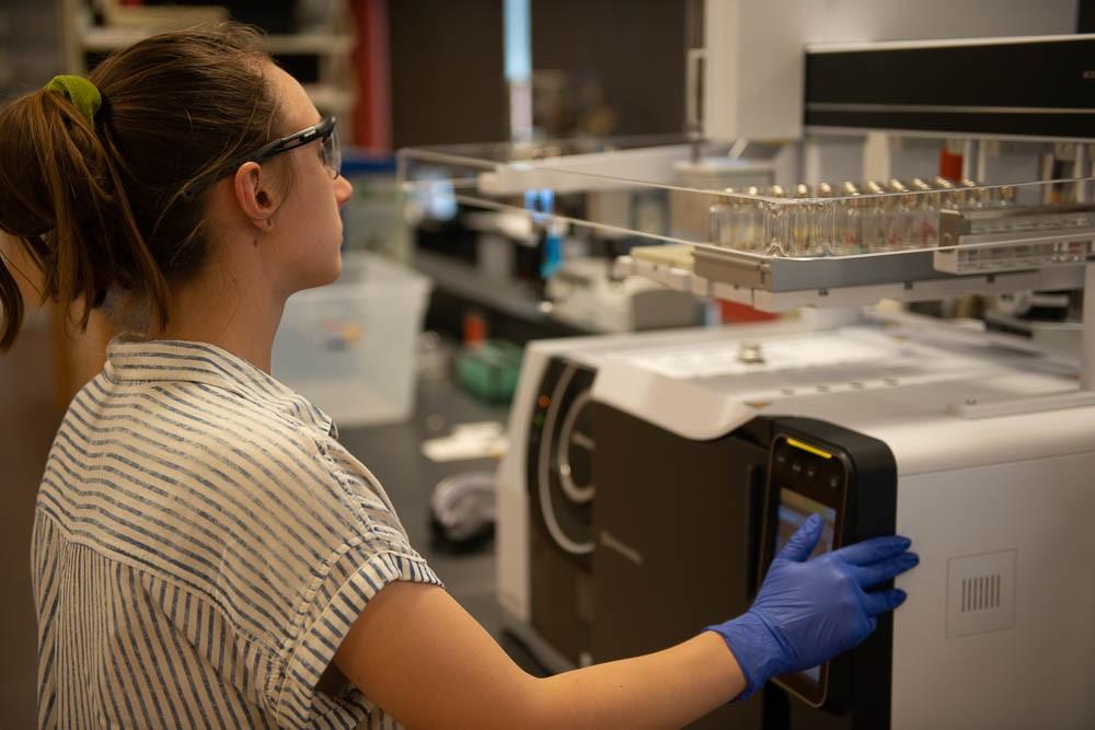 Student uses new Shimadzu GCMS equipment in one of the chemistry labs  on campus.