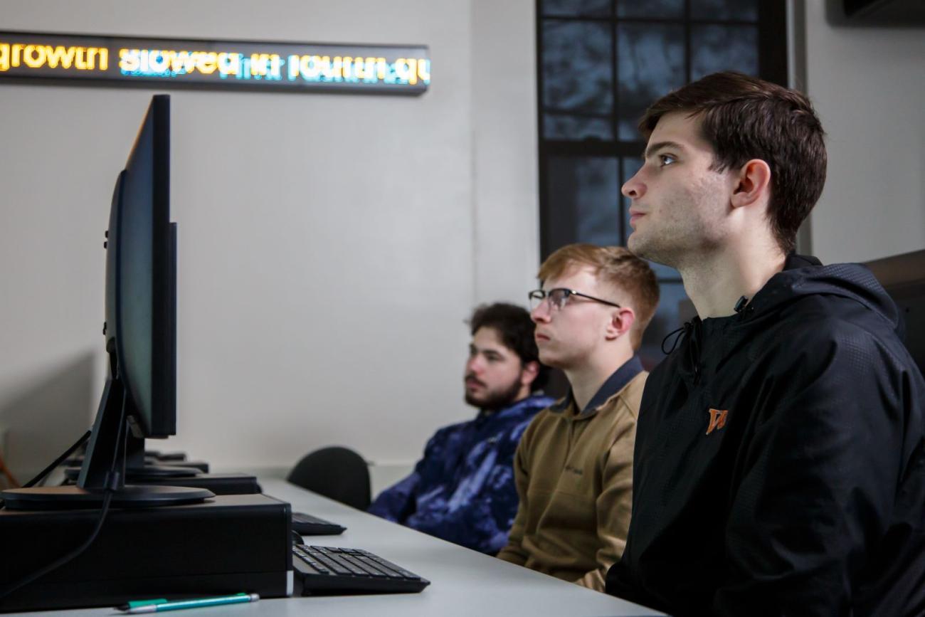 Students in the stock trading room in Hanna Hall