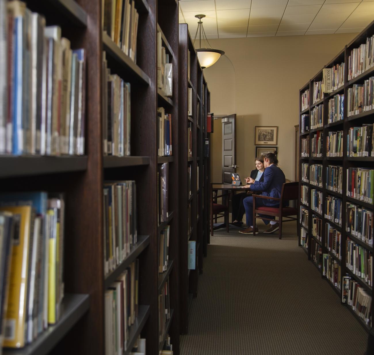 students in library at waynesburg university
