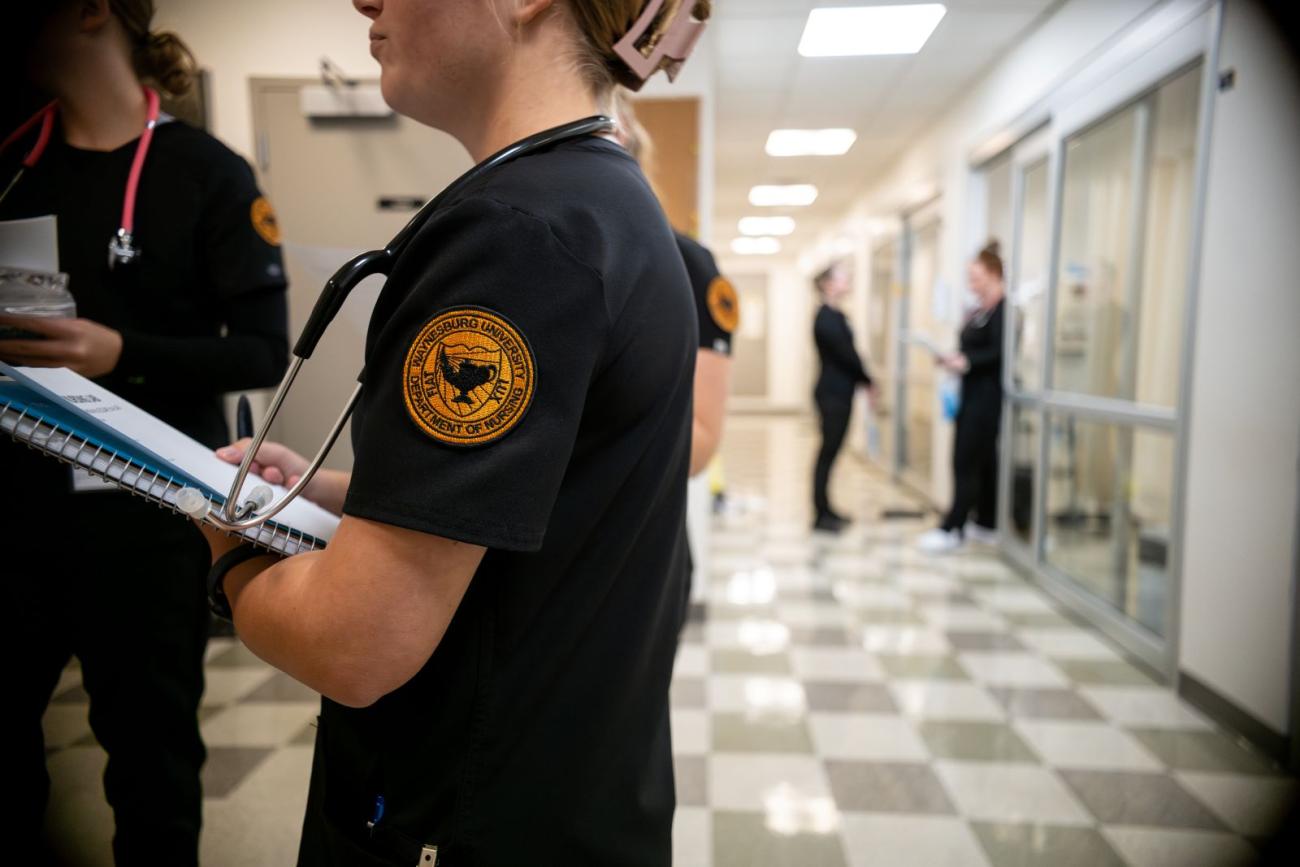 Undergraduate BSN students having class in the simulation lab