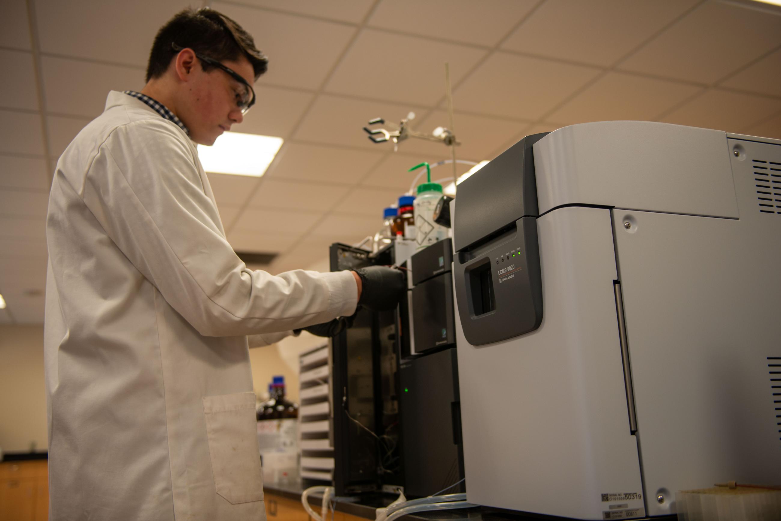 Andrew Gordon performs routine maintenance on the new LCMS