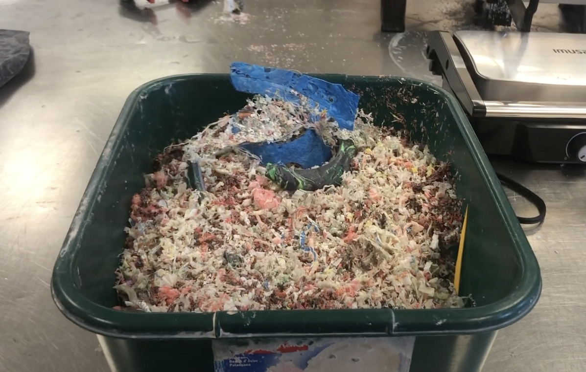 bin of plastic shavings