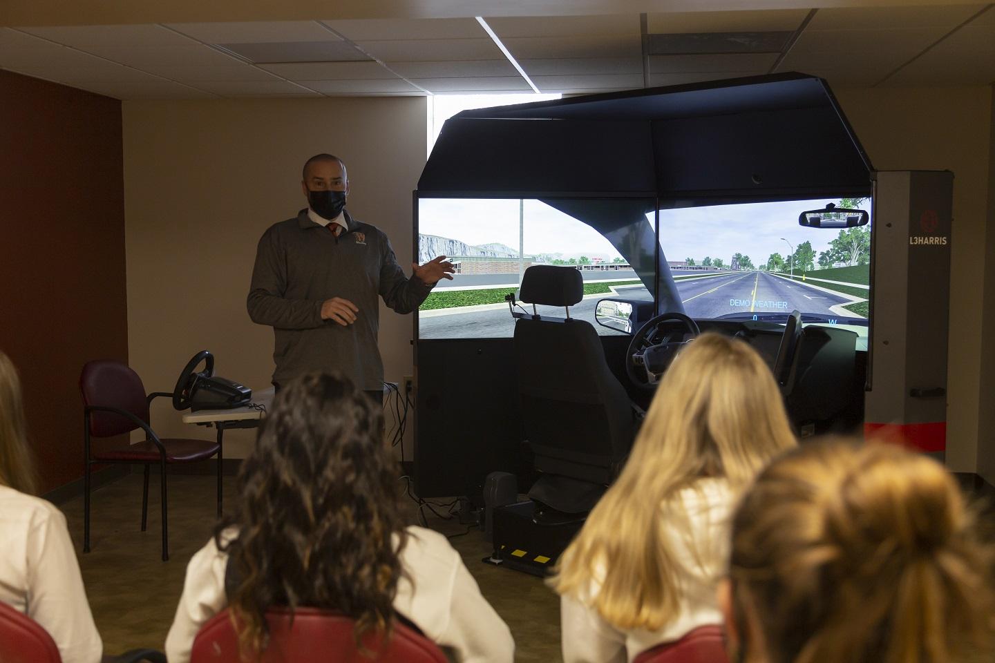 Adam Jack with Patrol Driving Simulator