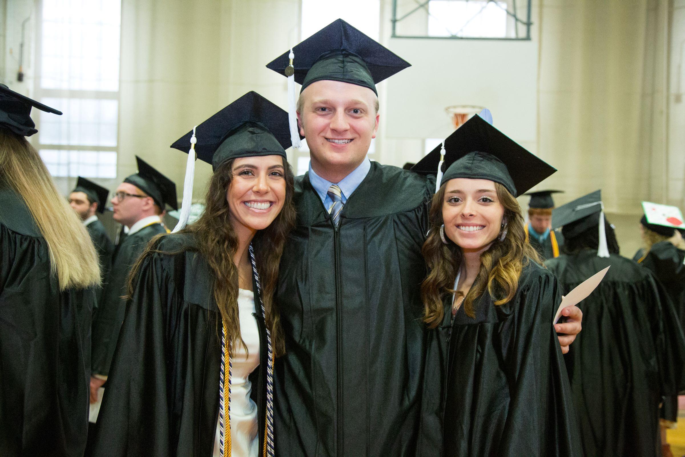 Undergraduate students preparing for Commencement 2023