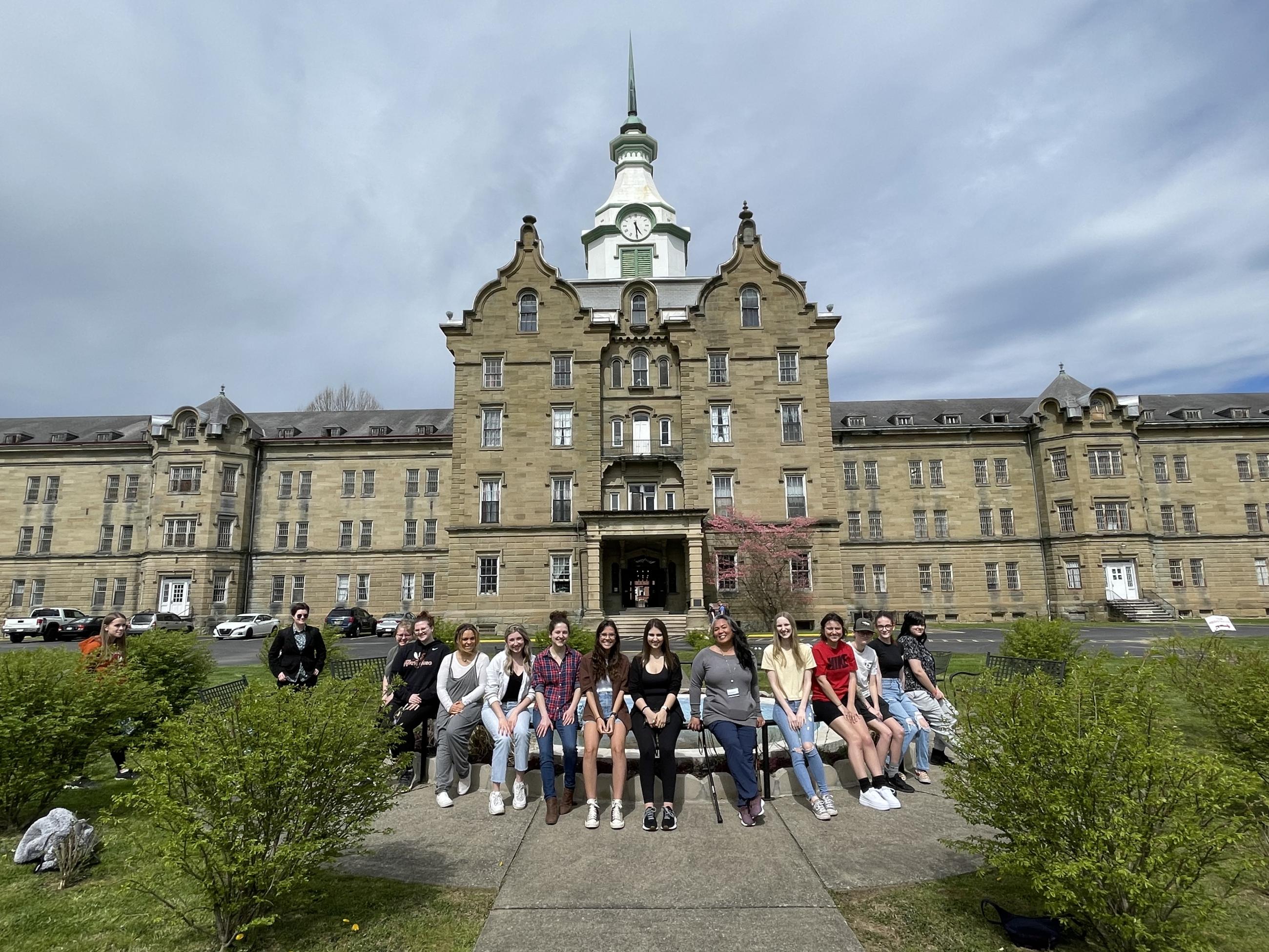 Dr. Mendoza and students outside the Trans-Allegheny Lunatic Asylum