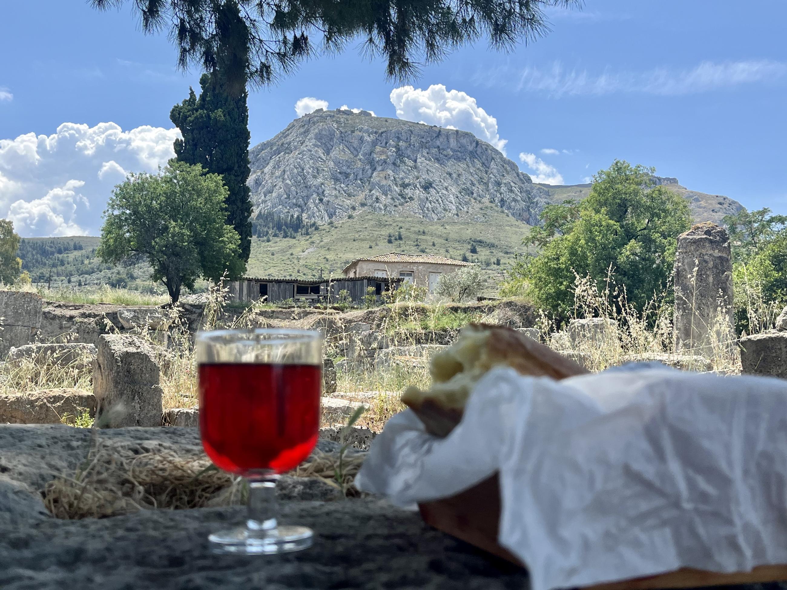 Sumpter documents Communion in Corinth, Greece, with the Acrocorinth in the background. 