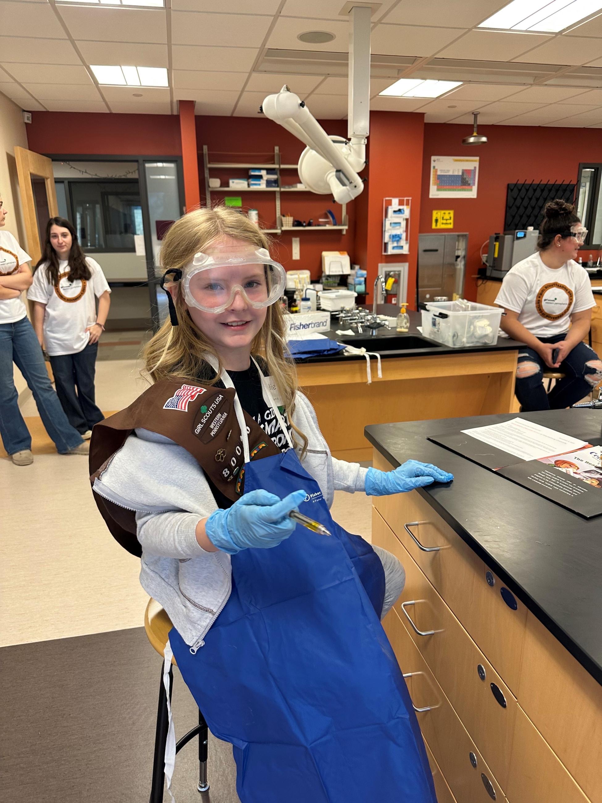 Girl Scout poses during STEM project at Badge Day