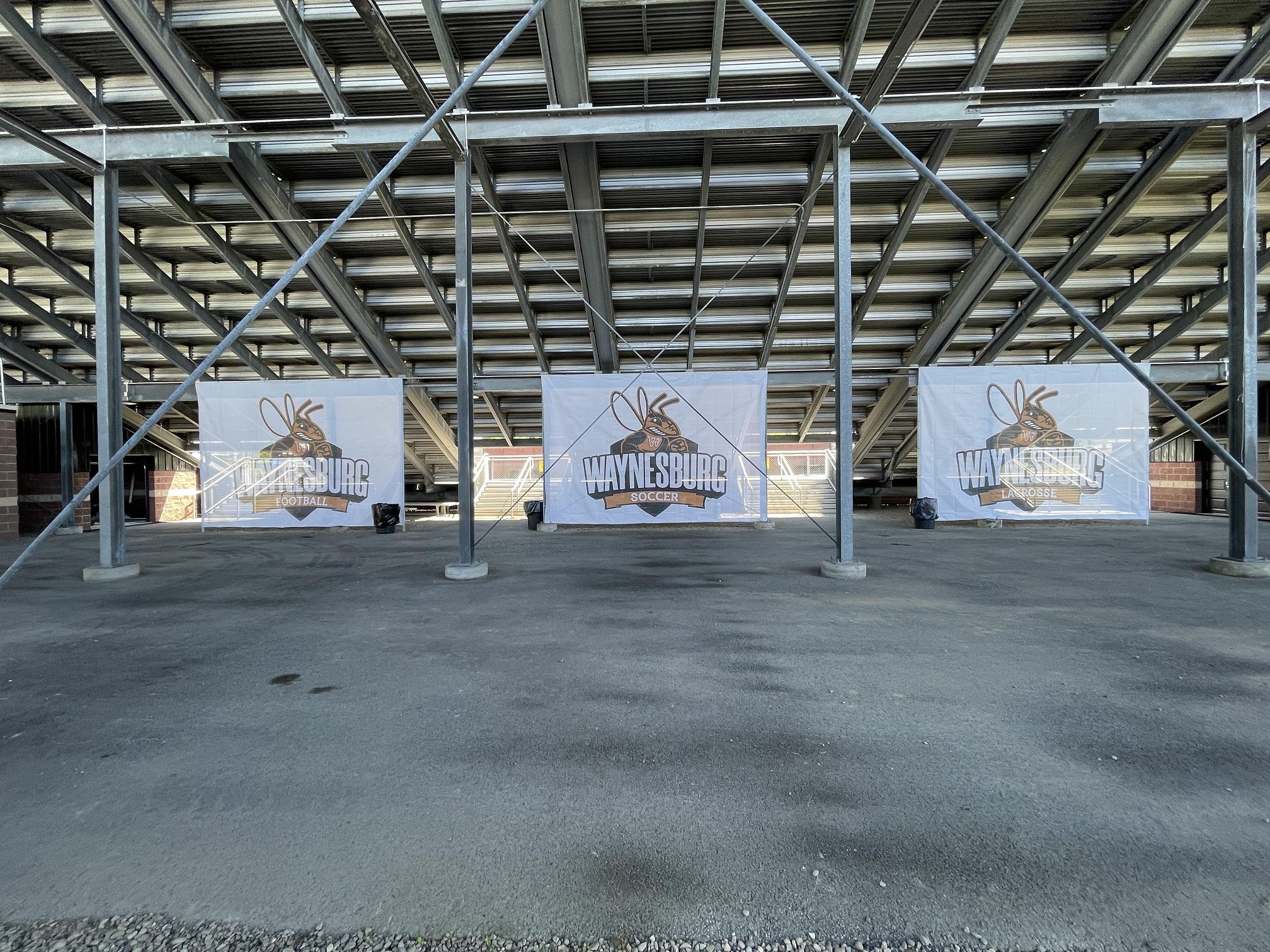 signs under bleachers