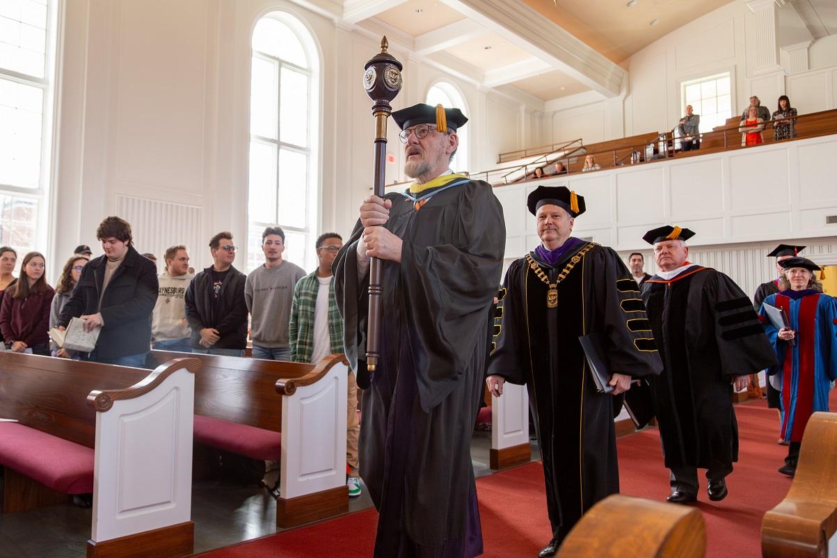 Faculty Marshal Rea Redd leads the Processional