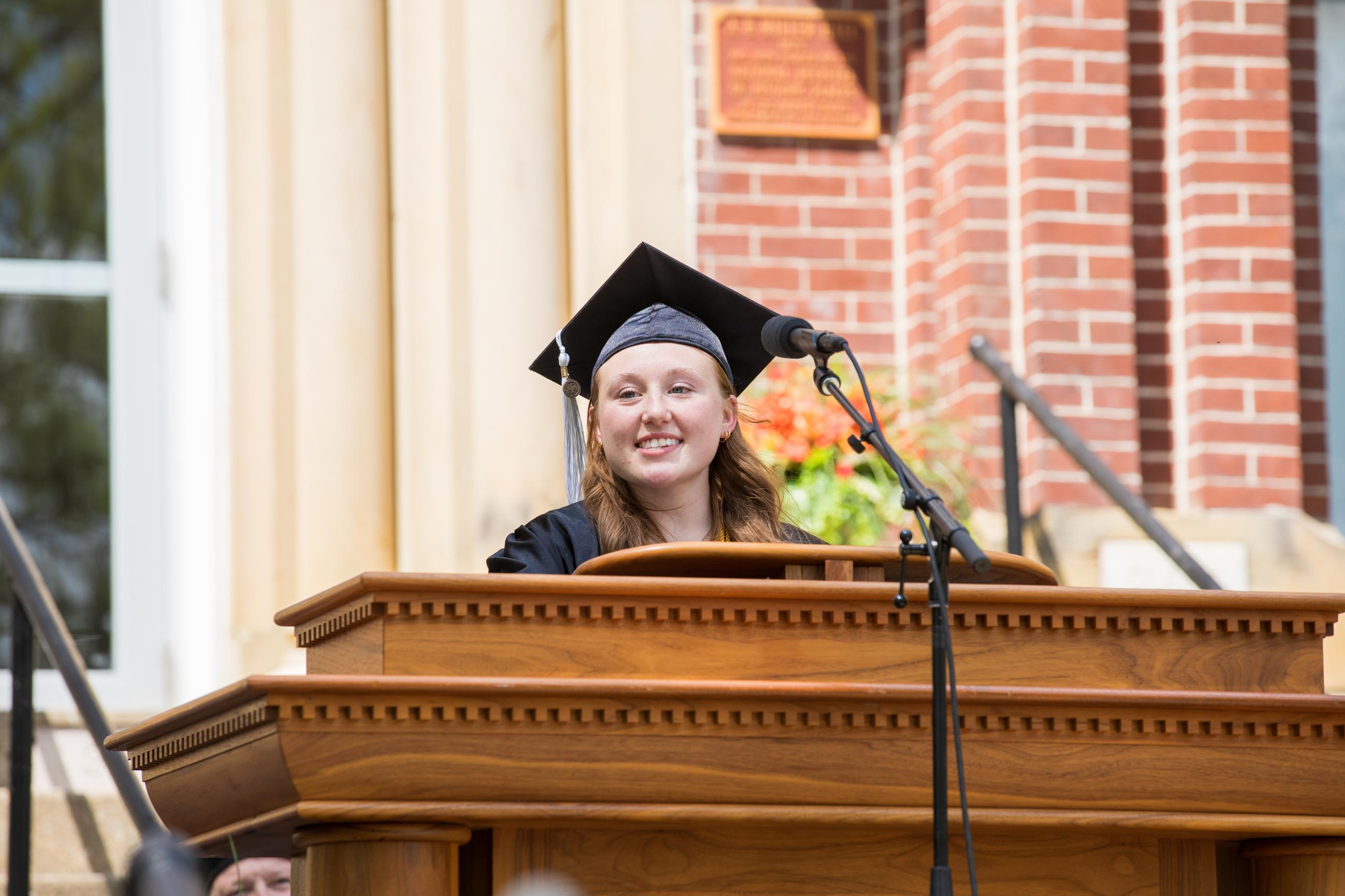 Valedictorian Gabrielle Michele Reifsnyder delivering the valedictory to the University.