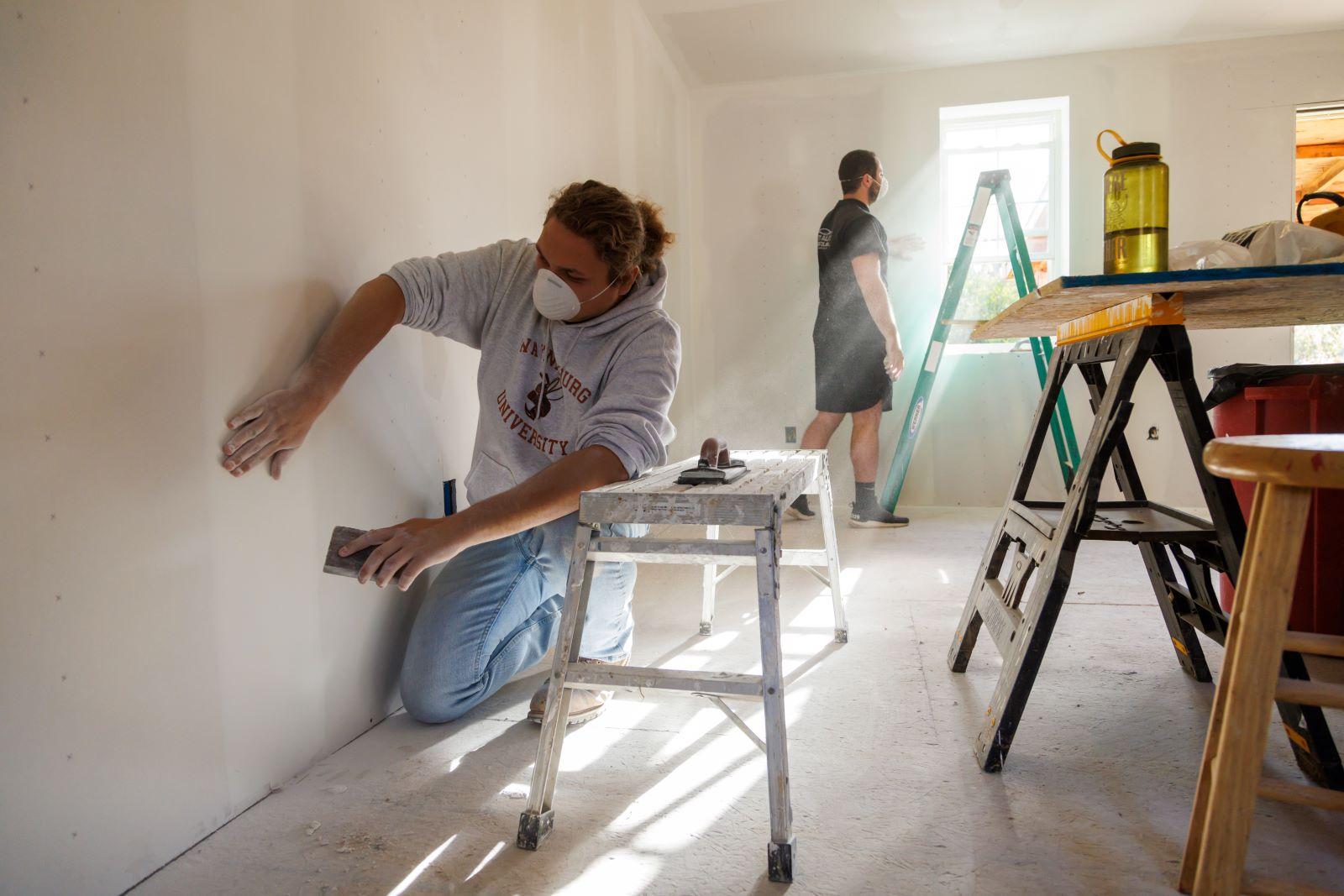 Waynesburg University students serving at Habitat for Humanity