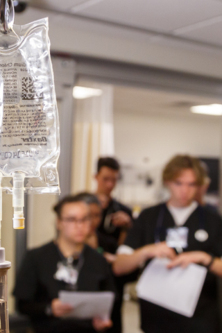 WU nursing students in hospital simulation classroom on campus