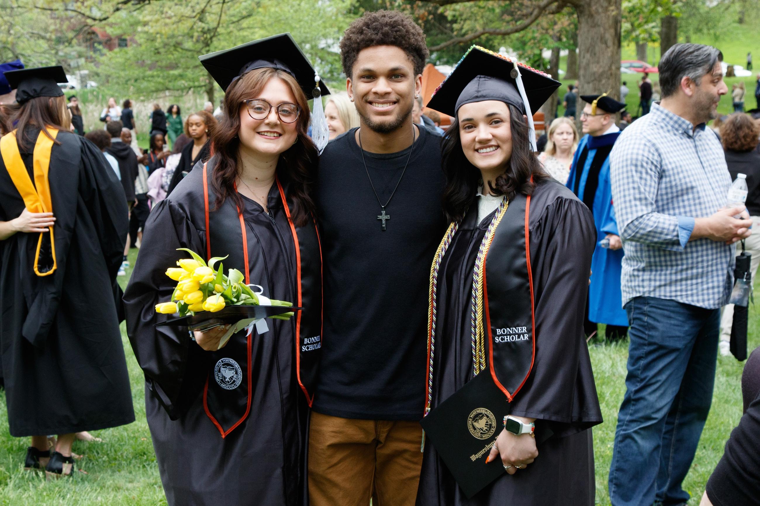 people in the park after graduation 