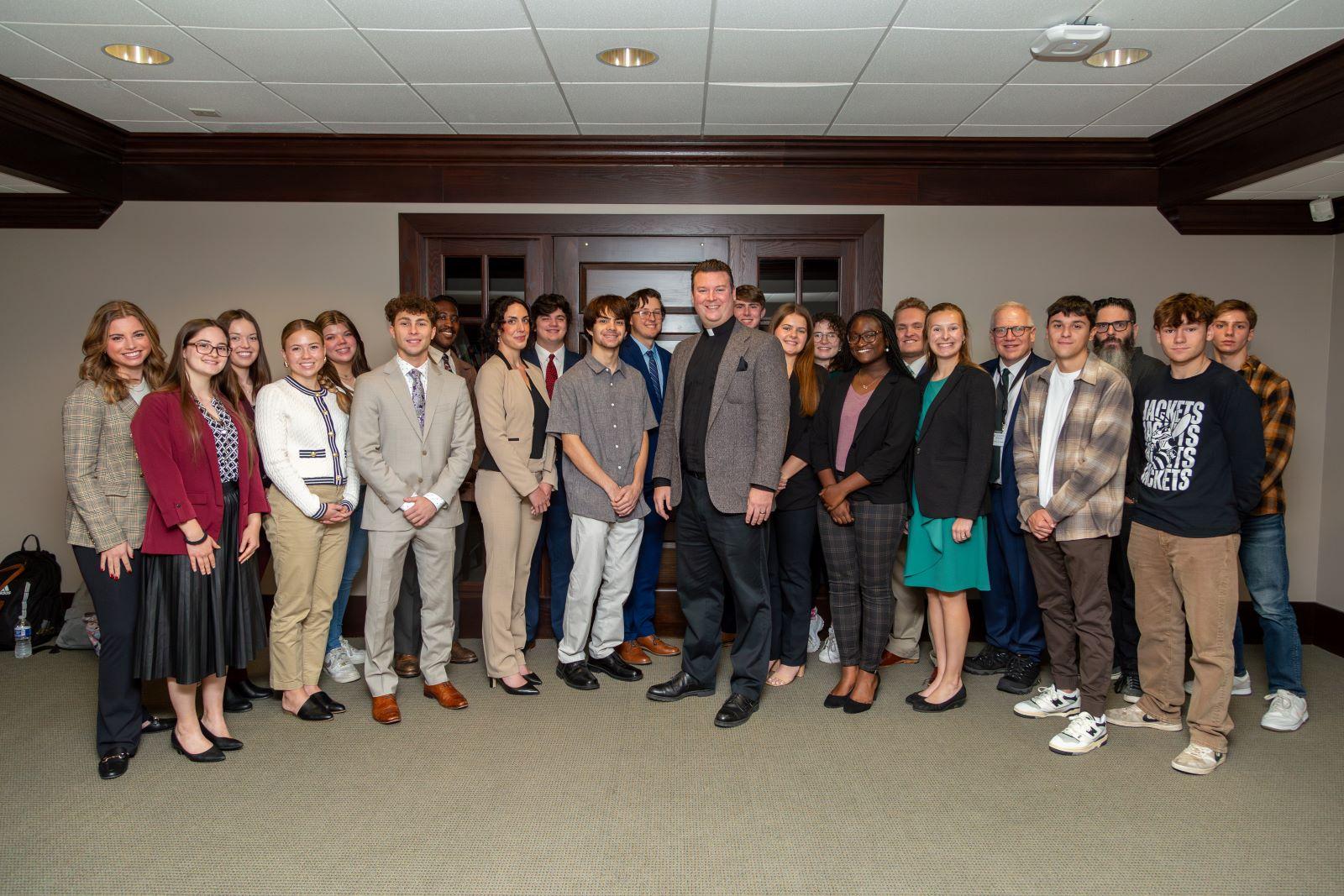 Stovers pose with guest lecturer