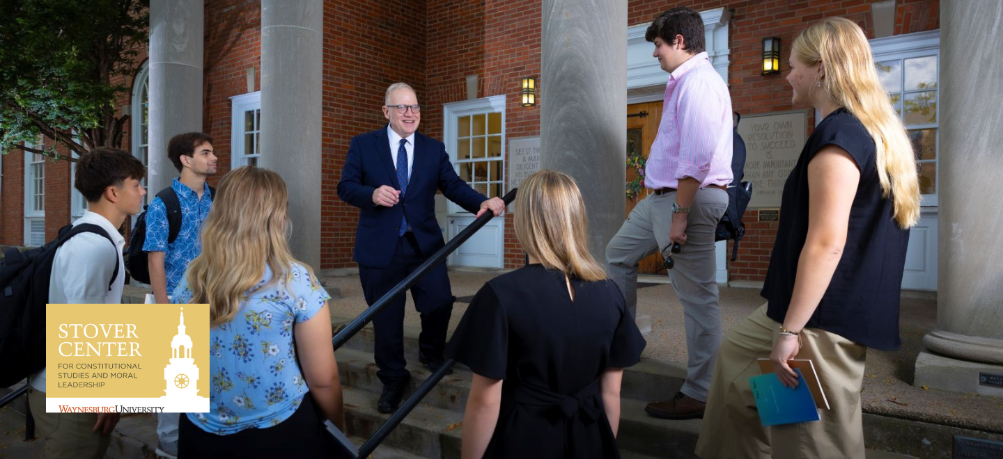Dr. Stratton and Stover Scholars on the steps of Eberly Library