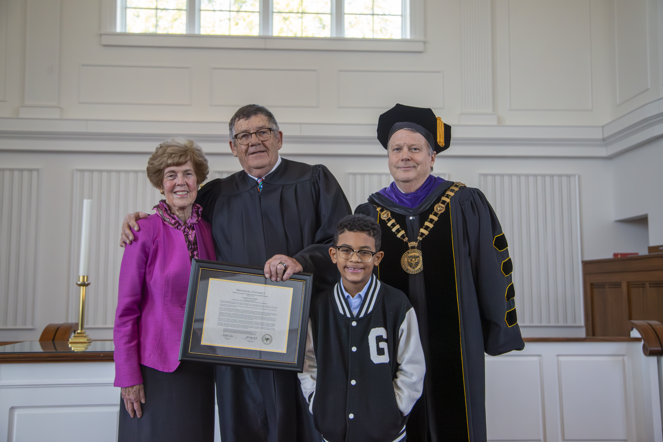 Pictured left to right: Mrs. Carolyn Thyreen, Lanny Frattare, his grandson Gus and President Lee