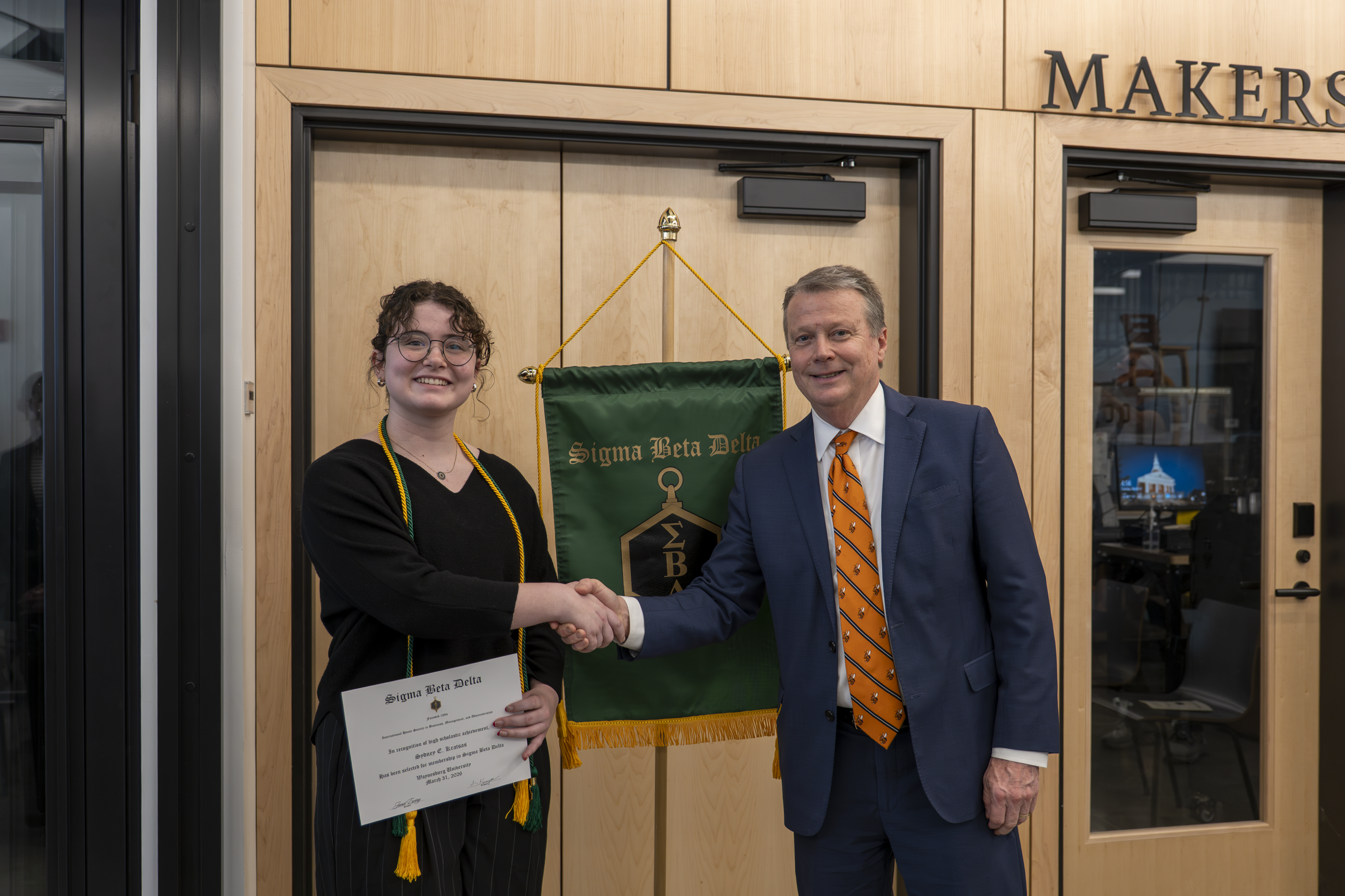 President Lee shook the hand of each honoree (pictured: Sydney Kratsas)