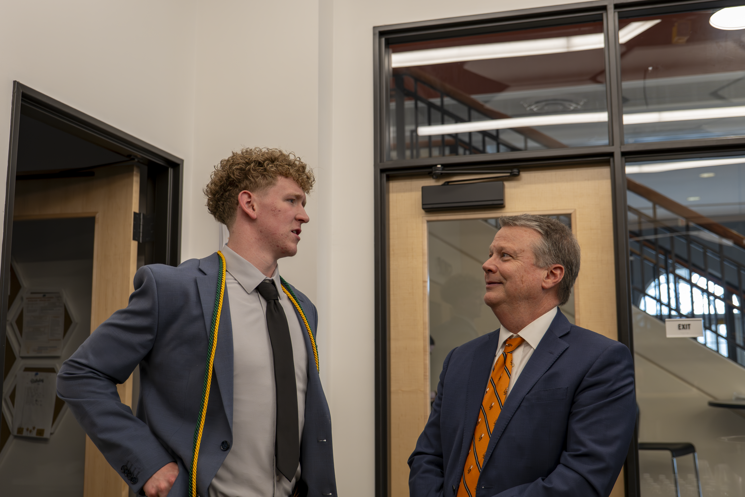 President Lee greeting student honorees