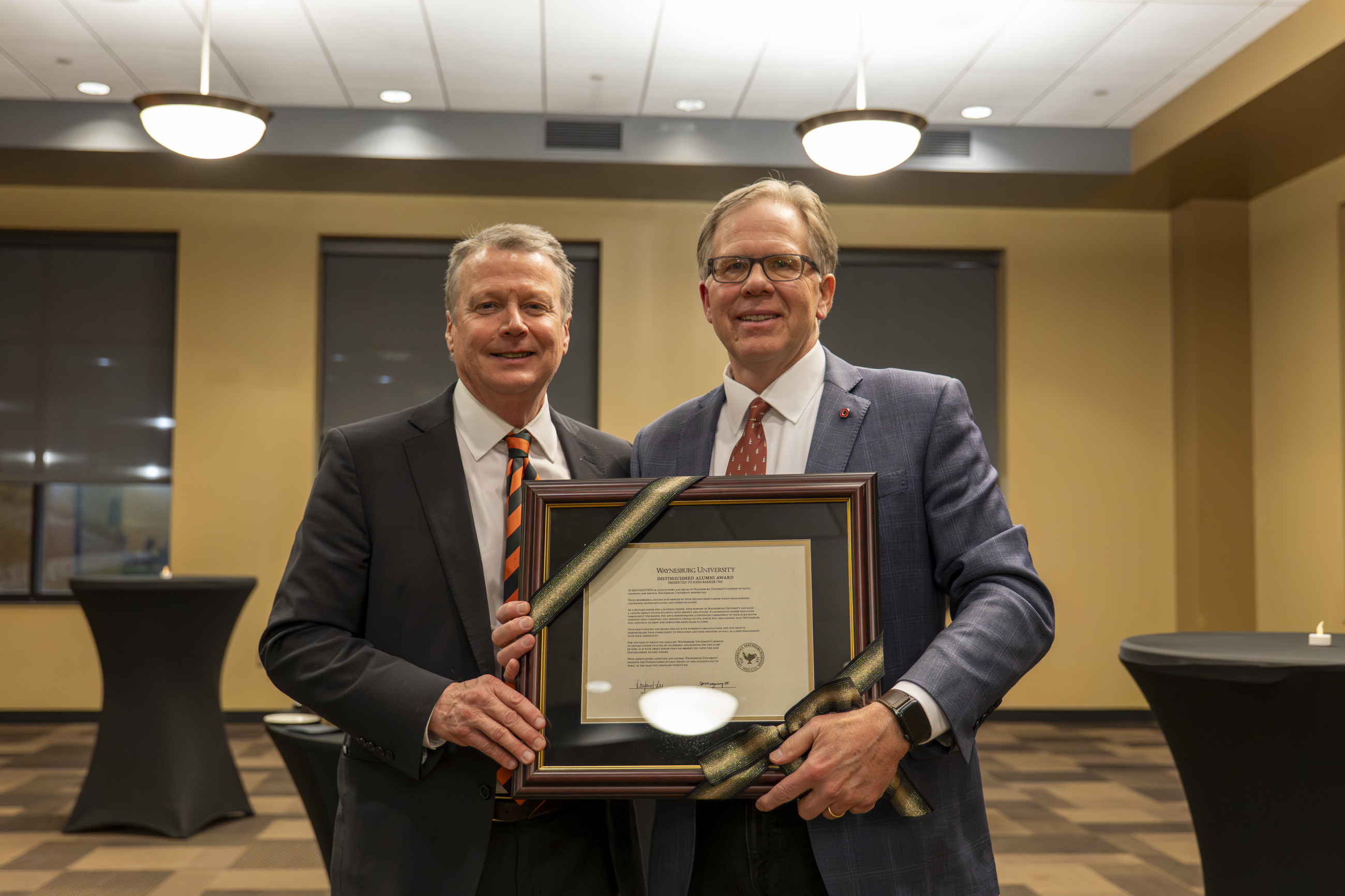 President Lee pictured with Distinguished Alumni Award winner, John Barker ('84)