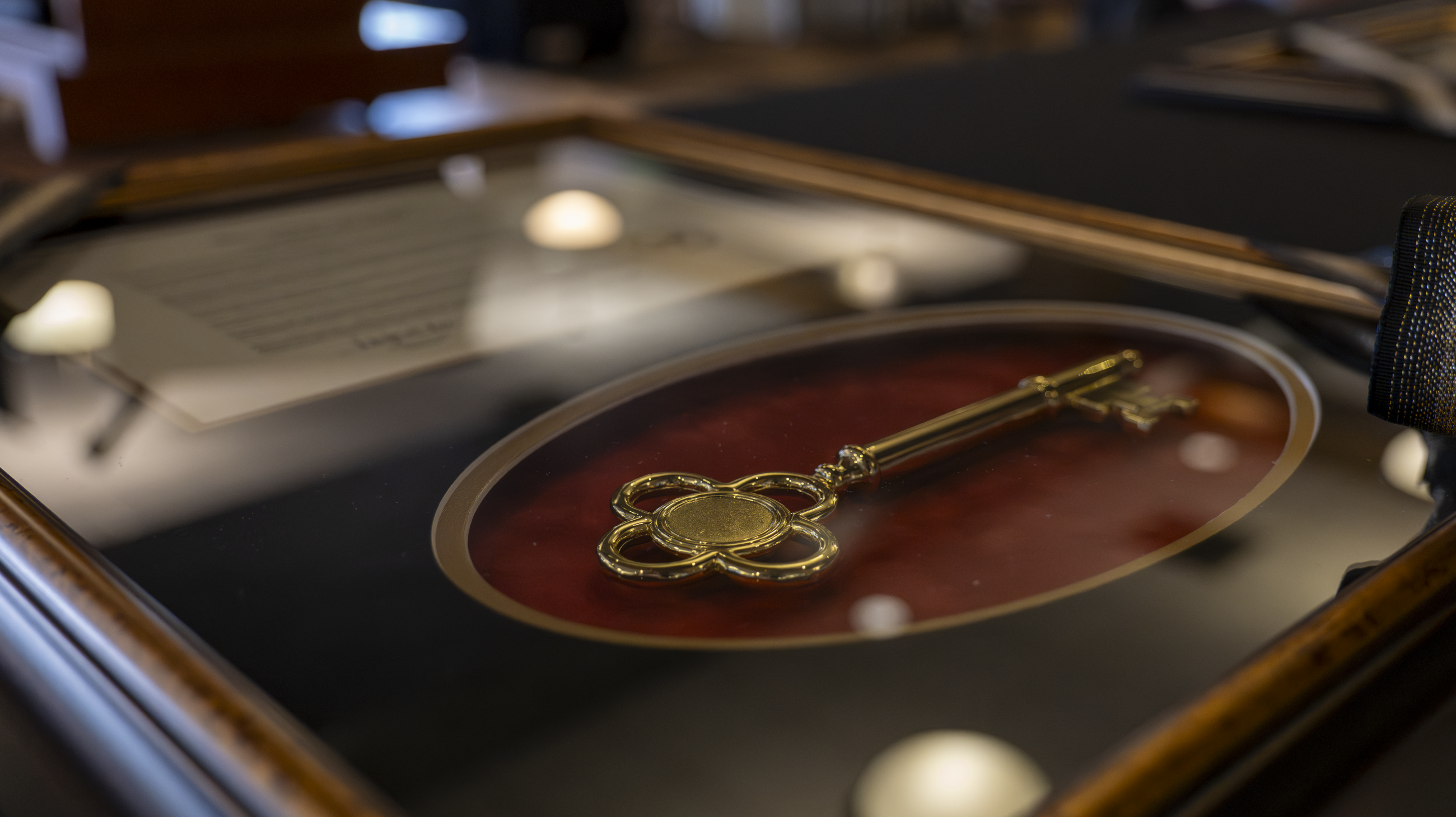 The framed Golden Key Award