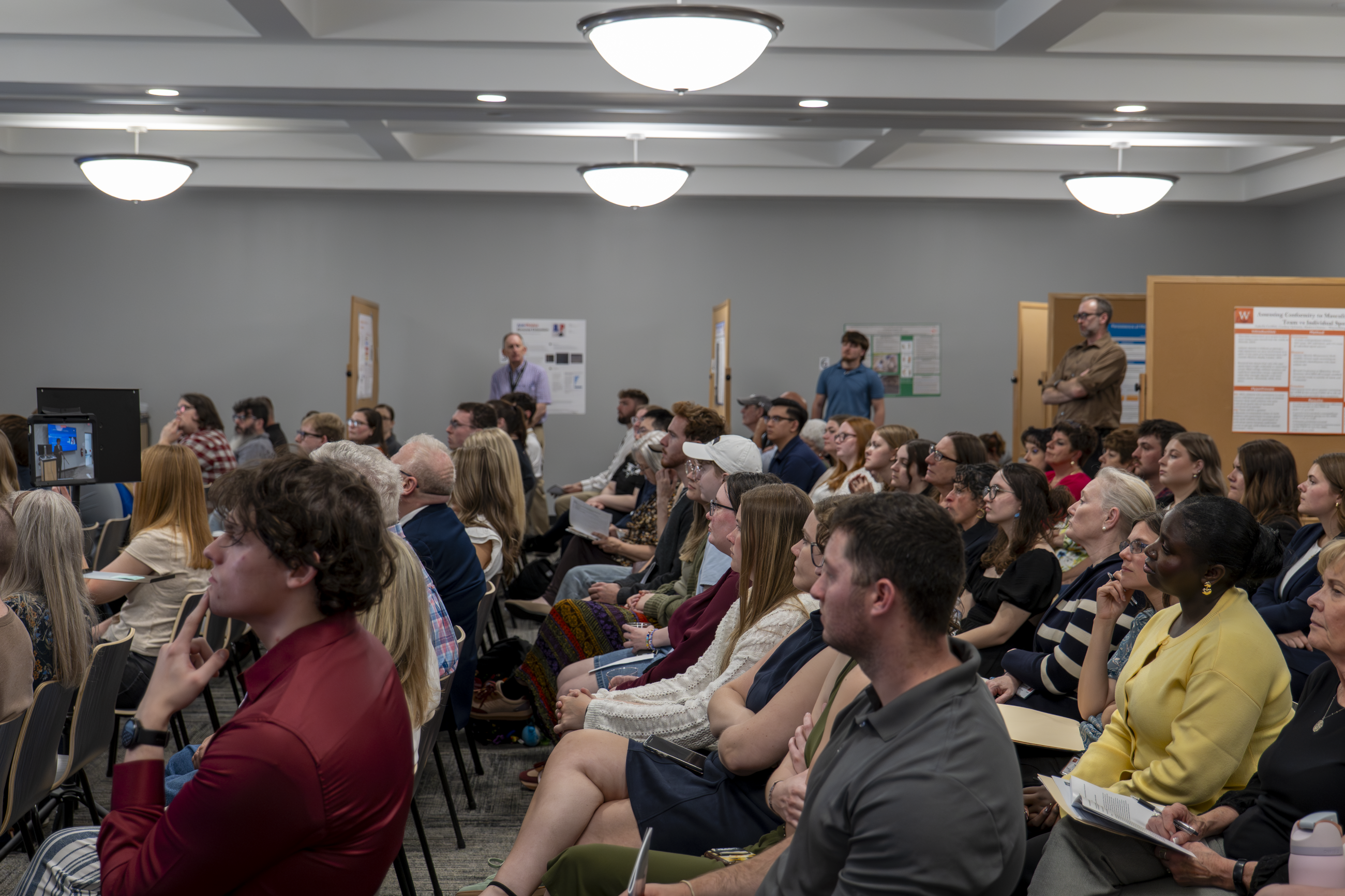 14th Annual Undergraduate Research and Scholarly Work Symposium attendees seated in the Center for Criminal Justice and Forensic Investigation