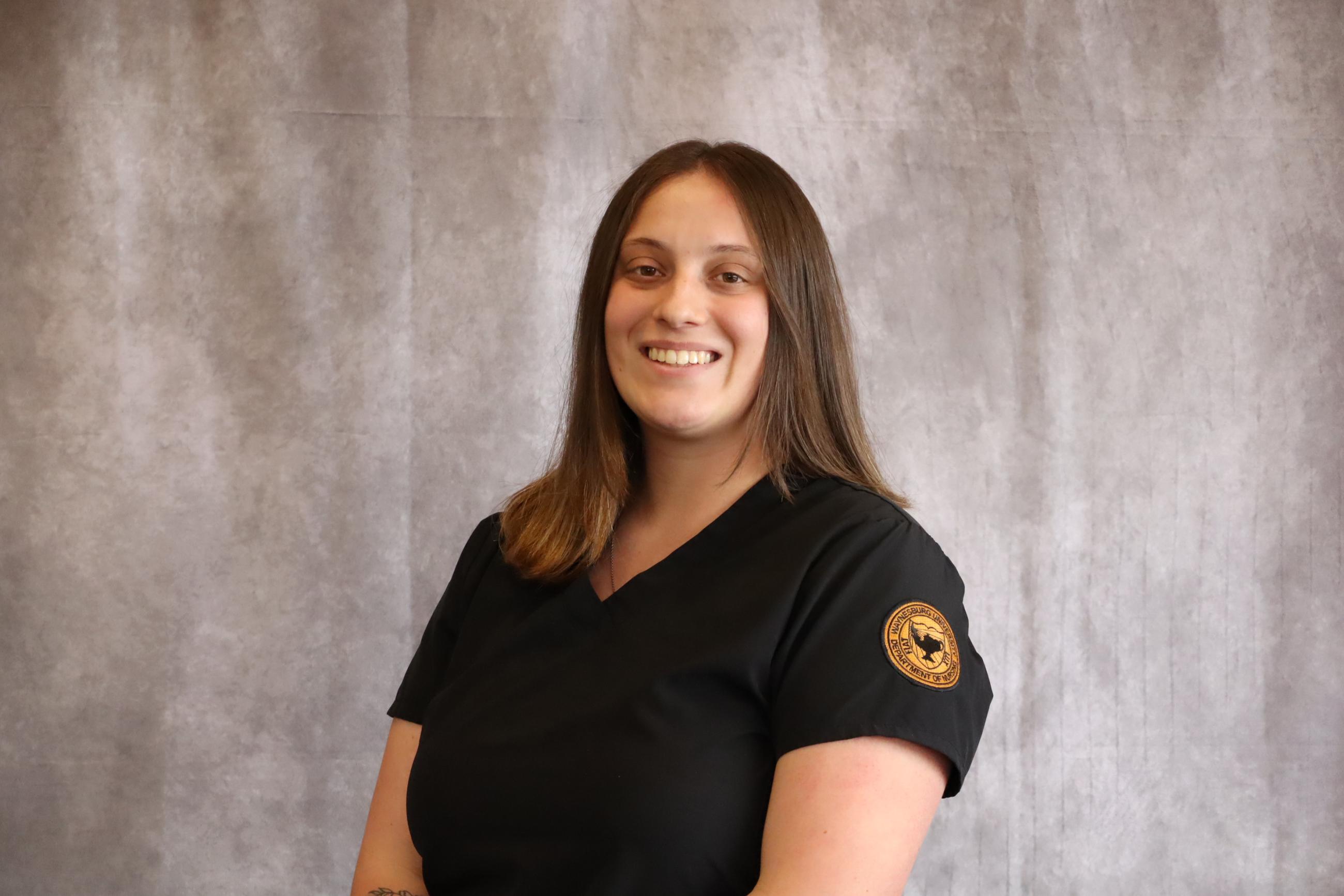Hannah Yorty is pictured in her Waynesburg University nursing program scrubs.