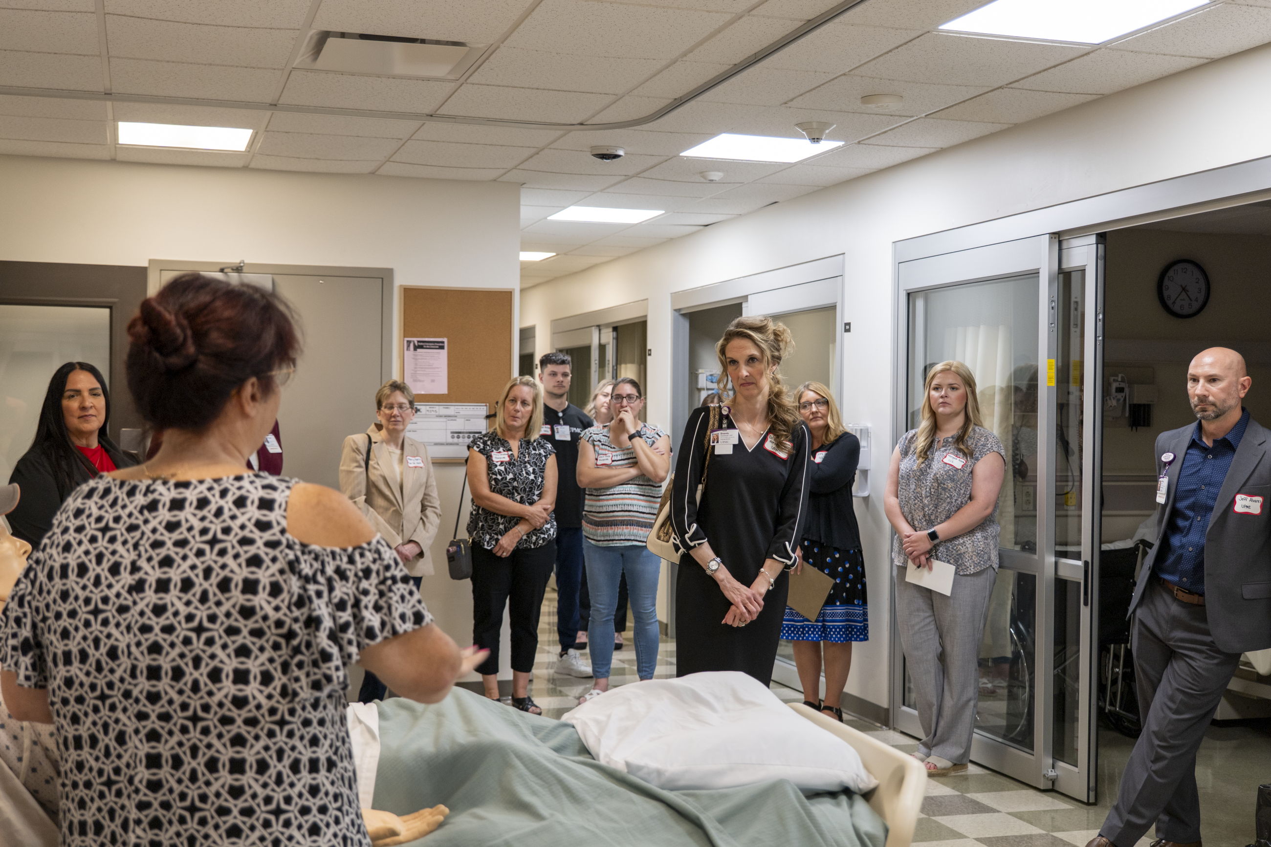 Local healthcare leaders, clinical partners, and representatives from community organizations touring the Clinical Learning Center on the first floor of Stewart Science Hall in the Department of Nursing at Waynesburg University