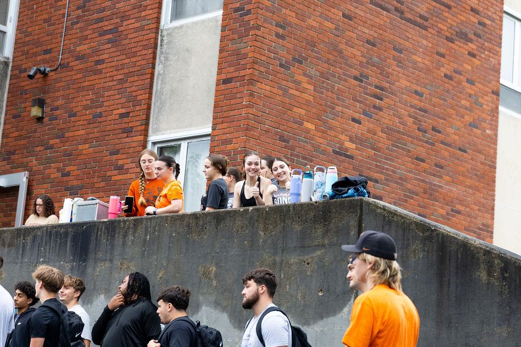 A group of students assisting with new student move in.