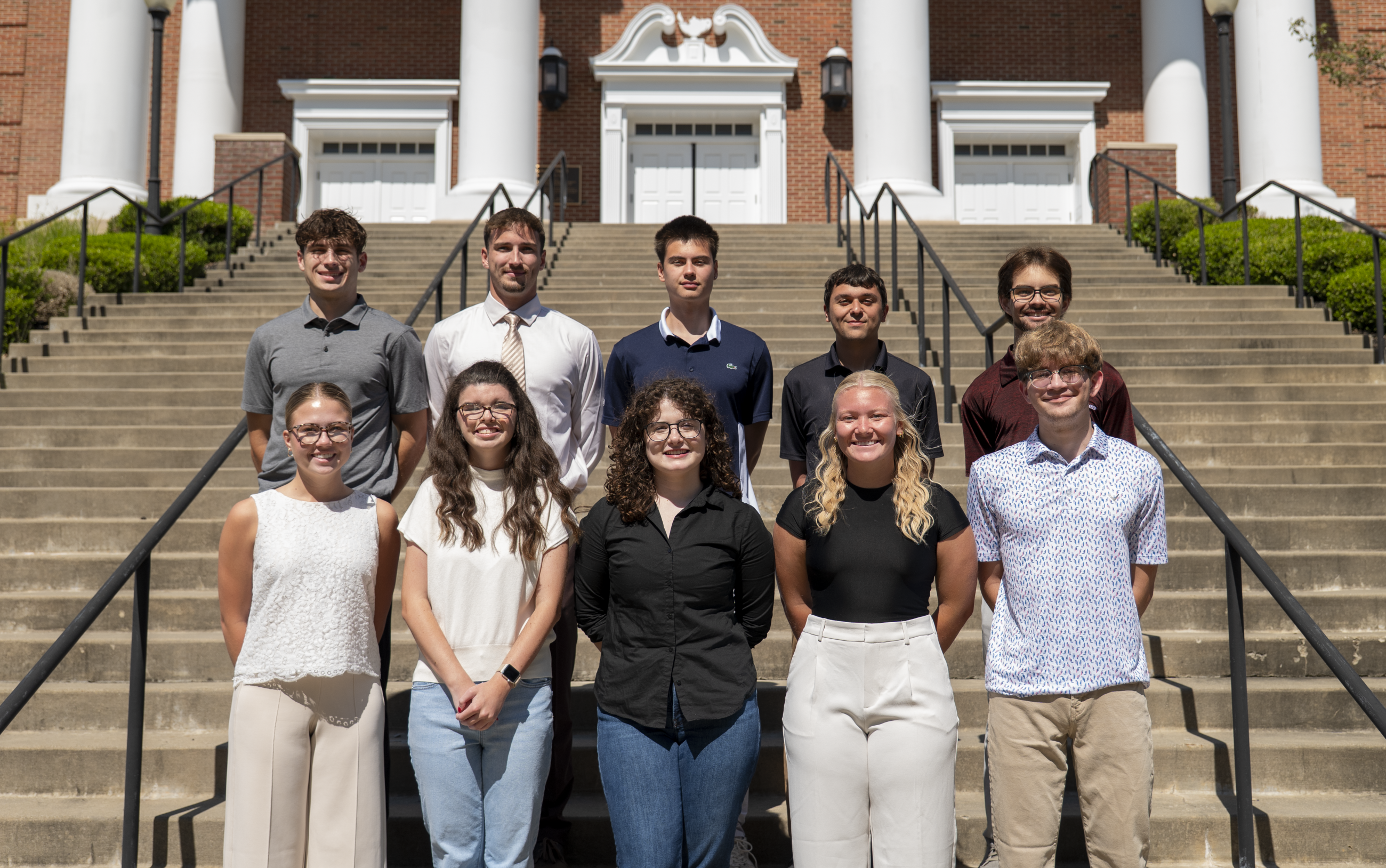 Pictured in front of Roberts Chapel, from left to right: (front row) Emma Shashura, Madalyn Sherbondy, Sydney Kratsas, Olivia Kale, Nathan Bennett; (back row) Justin Pasko, Colby Pauley, Tyler Gordon, Evan Como, Makai’o Nihipali-Sanchez (not pictured: Trent Giraffa)