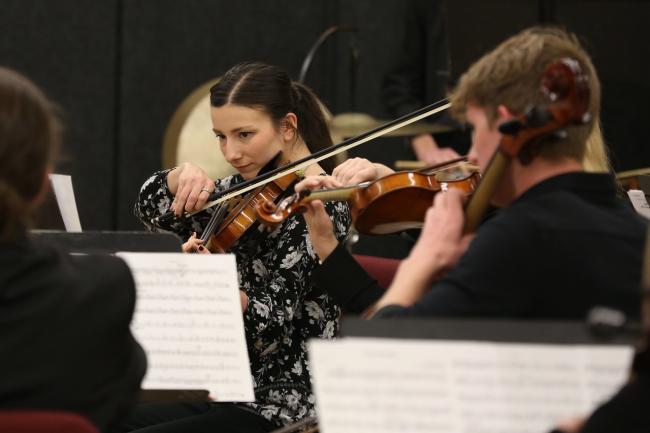 Students performing chamber music on campus