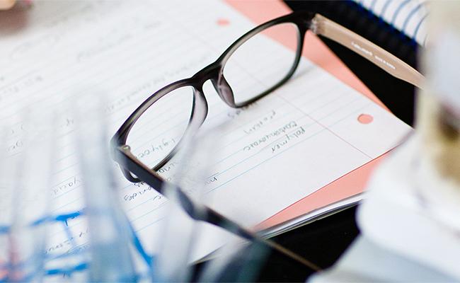 Papers and glasses on a table