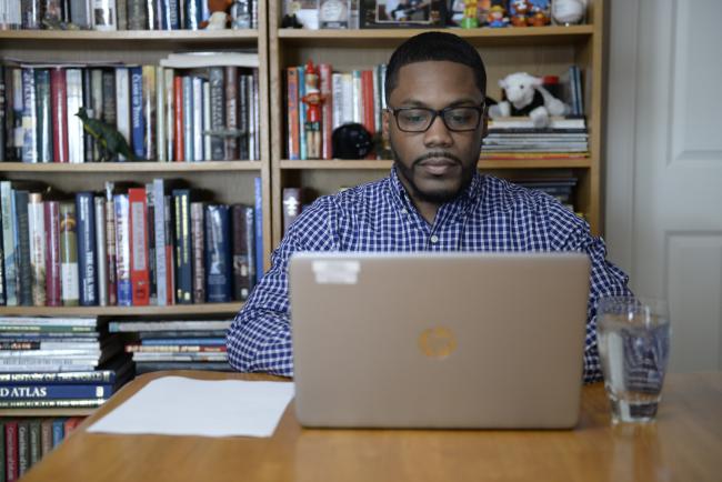 Student behind a computer