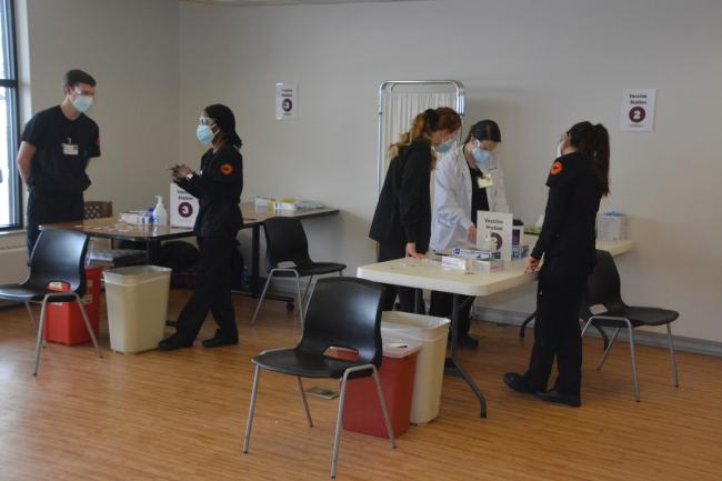 nursing students at vaccine clinic 