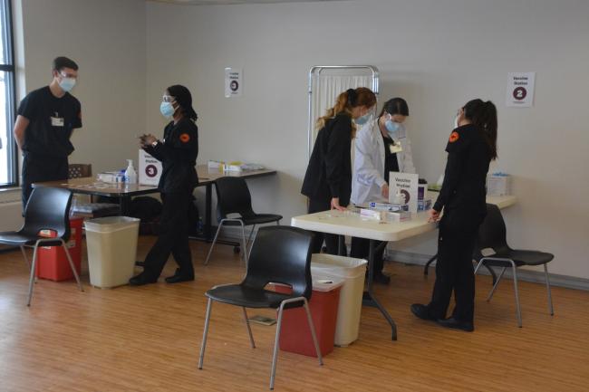 nursing students at vaccine clinic