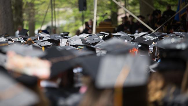 crowd of graduates on waynesburg university's miller lawn