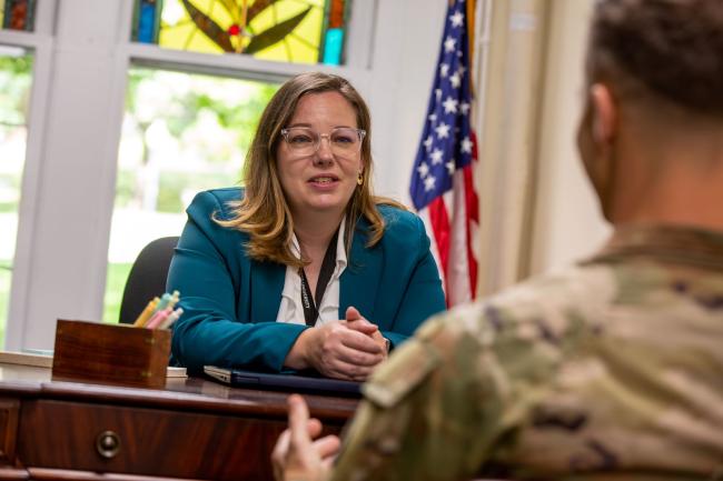 Michelle Steimer talks to student in Veteran and Military Affiliated Center