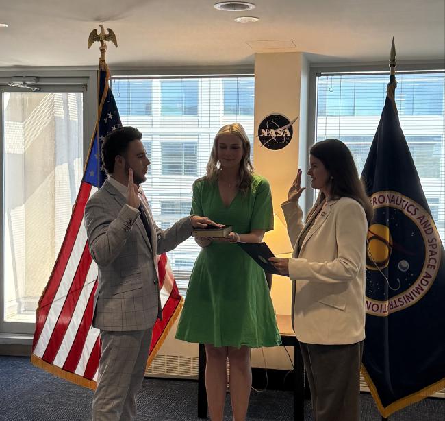 Luke Diel being sworn into appointment