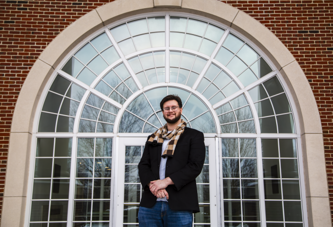 Steve Trettel standing in front of Stover Student Center