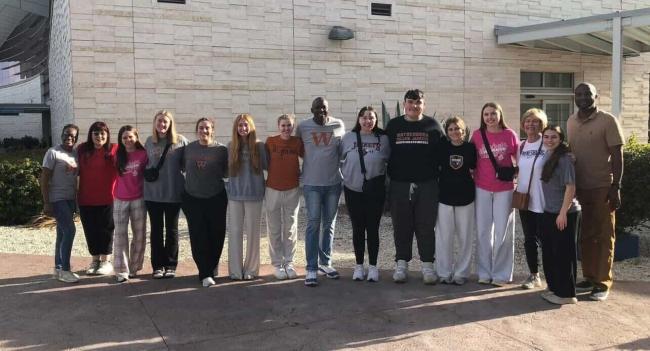 A group of Waynesburg University Nursing students and faculty pictured during their Spring Break 2026 service trip to the Bahamas